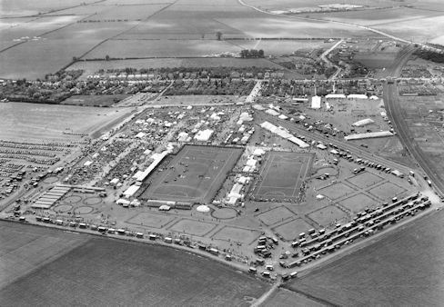 The 1949 Cambridge and Ely Agricultural Show on the Showground site, with Hobson�s Brook in the foreground, Shelford Road and Glebe Farm in the distance, Bishop�s Road to the upper right and the railway line to the far right. Photograph: Antony Pemberton, reproduced in Trumpington Past & Present, p. 130.