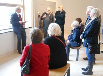 Arthur Brookes welcoming the group to the Visitor Center, Cambridge American Cemetery, Local History Group visit. Photo: Andrew Roberts, 1 March 2015.