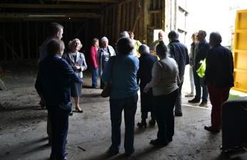 Richard Mortimer talking to a group in the interior of the main barn, Anstey Hall Farm, 10 May 2015.