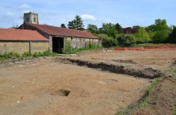 The excavated area at Anstey Hall Farm, with white tags marking Late Saxon post holes. Photo: Andrew Roberts, 10 May 2015.