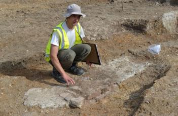 Stuart Ladd describing the Medieval clay working surface, Anstey Hall Farm, 10 May 2015.