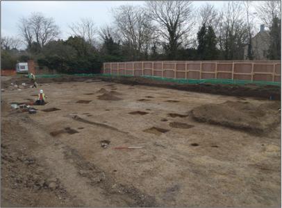 Excavating the Middle Saxon structure, Anstey Hall Farm excavation, 2015. Oxford Archaeology East.