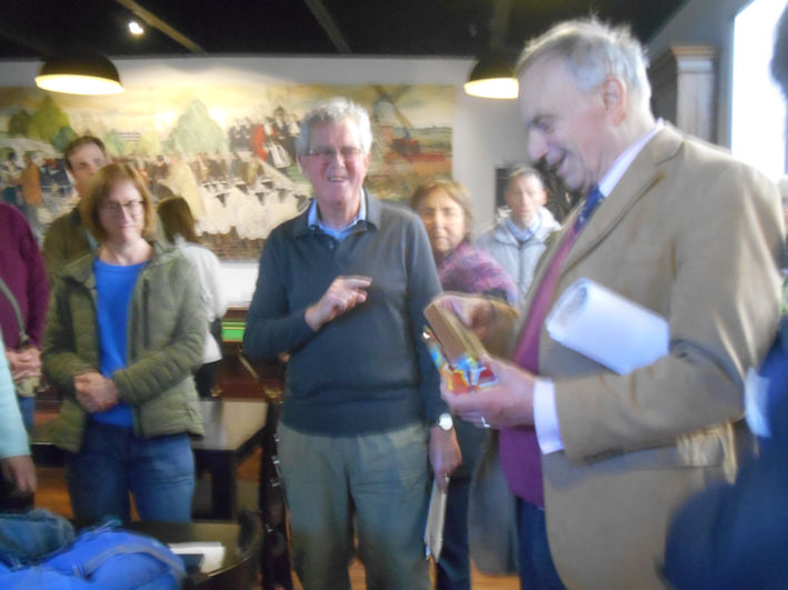 Andrew Roberts presenting a small gift to John de Bruyne, with our thanks. Photo: Wendy Roberts, 22 May 2025.