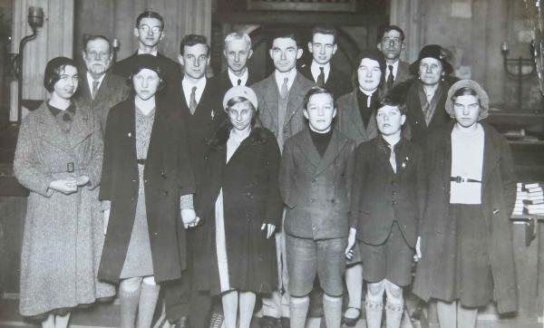 Trumpington Church choir c. 1933. Front row: Mary Raeburn Smith, Joan Freestone, Doreen Freestone, Eric King, ?, Rosie Newell. Back rows: ? Pamplin, ?, Martin Aves, ?, Mr Pouncey (choirmaster), Bob Smith (brother of Mary), Amy King, ?, ? Arthur Wilson, ?, ? Mrs Pamplin. Source: Audrey King, copy photo by Howard Slatter, March 2017.