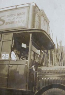 Eric King’s father, Arthur King, driving a bus. Source: Audrey King, copy photo by Howard Slatter, March 2017.