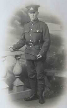 Audrey Rayner's uncle, George Rayner (born 1889), in his military uniform, December 1916, served in the Suffolks, 1914-18 (brother of Robert John Rayner, uncle of Audrey King). Lived in Alpha Terrace. Source: Audrey King, copy photo by Howard Slatter, March 2017.