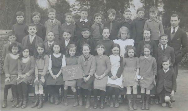 Trumpington School class, with Amy King fourth from left in front row, c. 1922. Source: Audrey King, copy photo by Howard Slatter, March 2017.