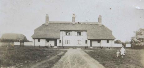 The King family home, Greenside, Trumpington High Street, with Eric King and Amy, about 1922. Source: Audrey King, copy photo by Howard Slatter, March 2017.