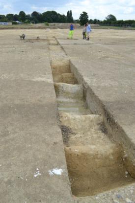 Cobbled areas and ditches on the Bell School archaeological site. Photo: Andrew Roberts, 25 July 2014.