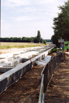 Looking north along the track bed for the Cambridgeshire Guided Busway, by the crossing at the end of the old railway cutting. Photo: Andrew Roberts, June 2010.