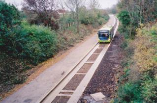 A test run on the guided busway, looking east along the railway cutting from Shelford Road bridge, early 2011. Photo: Peter Dawson.