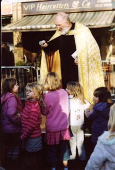 Canon Chris Savage as St Nicholas and local children, at the Trumpington Christmas Fair, 6 December 2008