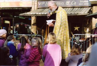 Canon Chris Savage (Chaplain to the Mayor) as St Nicholas and local children, at the Trumpington Christmas Fair, 6 December 2008