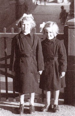 Outside the gate of Trumpington Church School, 1948, Dianne Camps on left, June Newell on right. Photo: Dianne Fraser (née Dianne Camps).