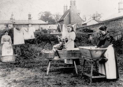 Mrs Elizabeth Matthews and two of her daughters with laundry (reproduced in Old Picture Postcards, plate 62). (Stephen Brown).