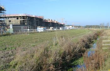 Construction work on homes alongside Hobson's Brook, from Addenbrooke's Road. Photo: Andrew Roberts, 1 November 2015.