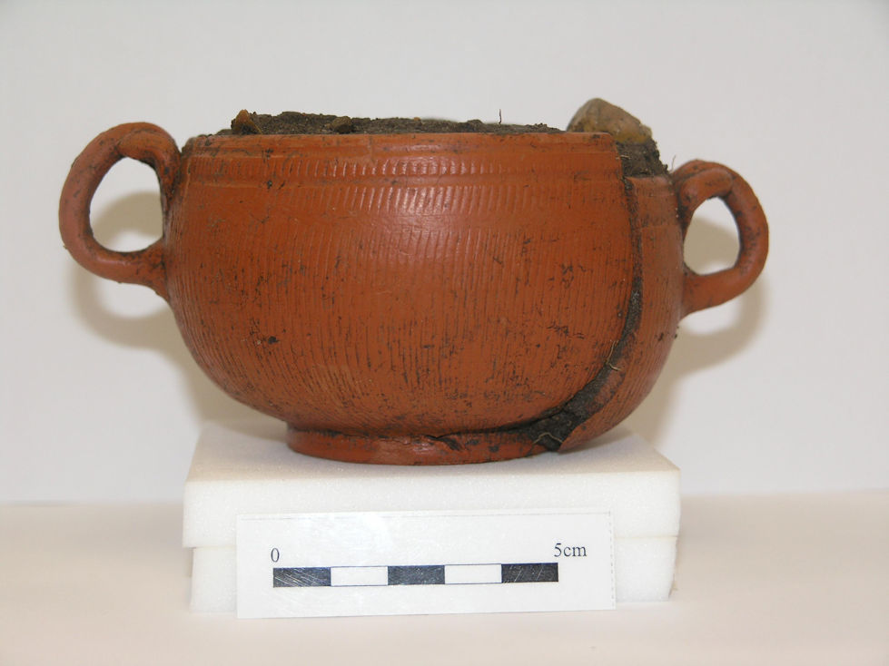 Samian cremation bowl dated to 10-30 AD from the cremation pit. Source: Oxford Archaeology East, 10 February 2011.