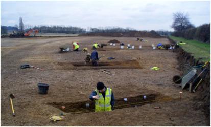 Excavating the field to the east of Fawcett Primary School (now Woodpecker Way, Aura development). Oxford Archaeology East, early 2011.