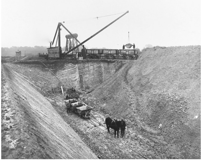 Figure 13: Coprolite digging in Trumpington during WW1, deep pit and trucks, c.1917–18. Photo: Courtesy of Henry Boot and Son. Copy from Bernard O'Connor.