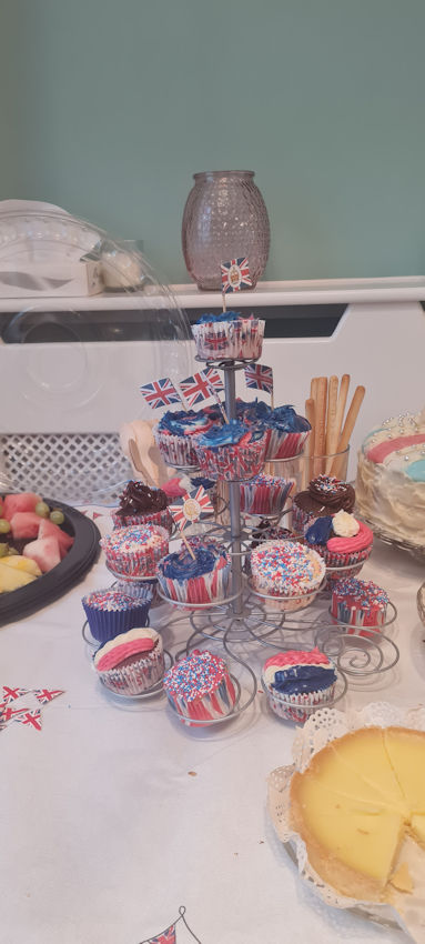 Tempting cup cakes, Coronation tea at Denis Wilson Court. Photo: Sam Oliver, 5 May 2023.