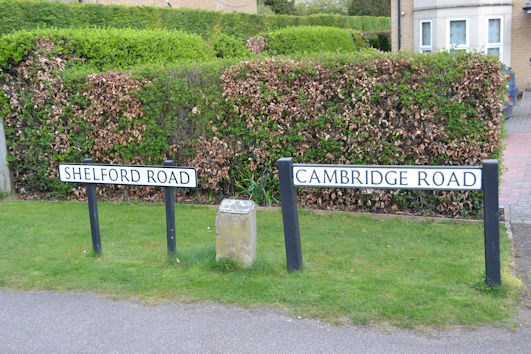 The Shelford Road and Cambridge Road signs and the plaque referring to a tree (now removed) planted to commemorate the Coronation in 1953, on the east side of the road. Photo: Andrew Roberts, 2 April 2017.