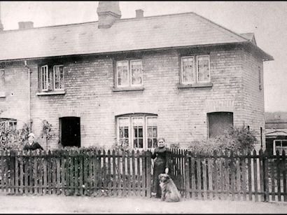 Mrs Matthews outside her house in the High Street (now 42 High Street). Photograph reproduced in Trumpington in Old Picture Postcards, 61. Source: Charlie Matthews and Nellie Burbridge (née Matthews), Stephen Brown.Source: Stephen Brown.