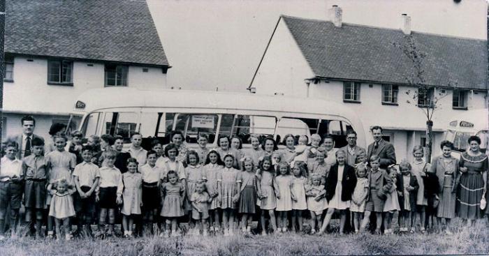 Photograph 4: participants beside one of the coaches. Source: Geoffrey Mott and Karen Guttery (née Karen Mott).