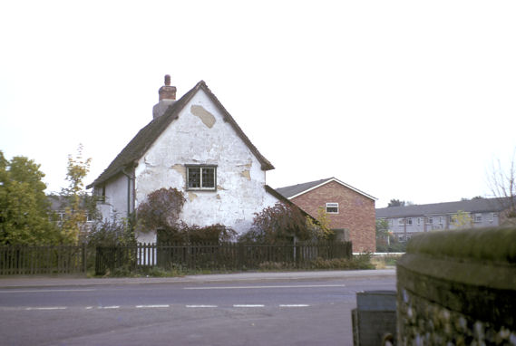 The house to the north of Manor Farm, before demolition, with the new houses in Beverley Way in the background, c. 1973. Photo: Peter Dawson.
