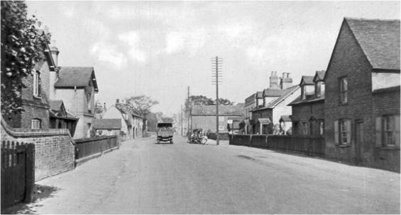 Trumpington High Street looking north, with Saunders store in distance. Shirley Brown.
