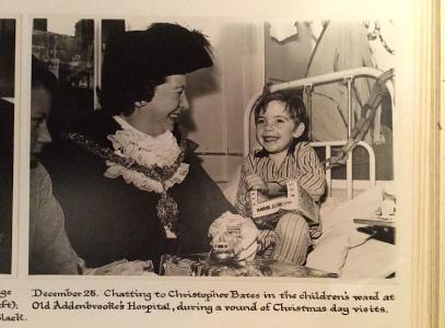 Jean Barker, Mayor of Cambridge, at Old Addenbrooke's Hospital, 25 December 1971. Photograph in Baroness Trumpington's archive, captioned "December 25. Chatting to Christopher Bates in the children's ward at Old Addenbrooke's Hospital, during a round of Christmas Day visits." Photo: Adam Barker, October 2019.