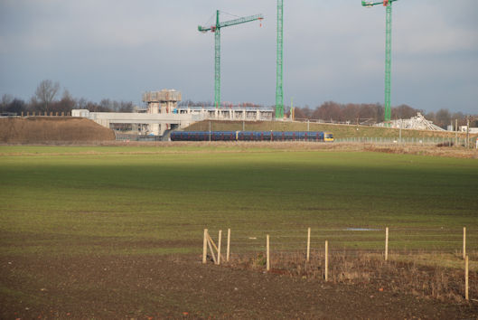 The proposed location of Cambridge South Station, with a Cambridge to King's Cross train, Class 365 EMU. Edmund Brookes, 1 January 2010.