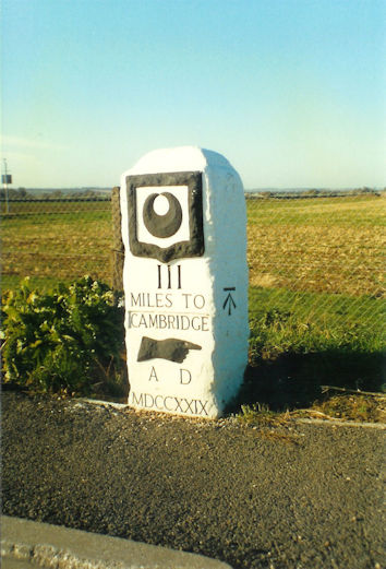 The third milestone on Hauxton Road, before the growth of the hedgerow, c. 1996. Photo: Ken Fletcher.