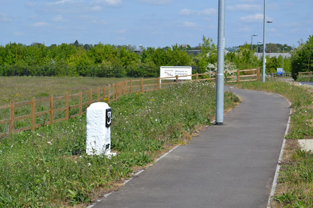 The third milestone after its repositioning on Hauxton Road, looking towards the Park & Ride site. Photo: Andrew Roberts, 4 May 2011.