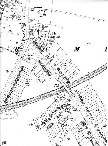 Ordnance Survey map, 1939, with most plots now in use, both sides of the road and the railway line.