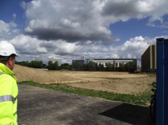 Looking across the Papworth archaeological site during the Local History Group visit. Photo: Randall Evans, 18 August 2014.