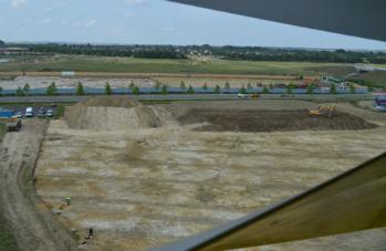 View from the Addenbrooke’s Car Park across the Papworth archaeological site and the AstraZeneca site, with the railway and Clay Farm in the background. Photo: Andrew Roberts, 25 July 2014.