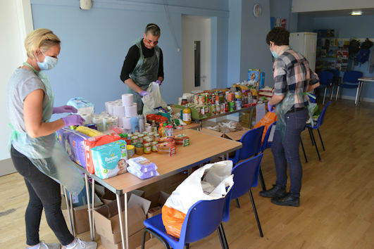 Volunteers setting up Trumpington Food Hub in Trumpington Pavilion. Photo: Andrew Roberts, 19 May 2020.