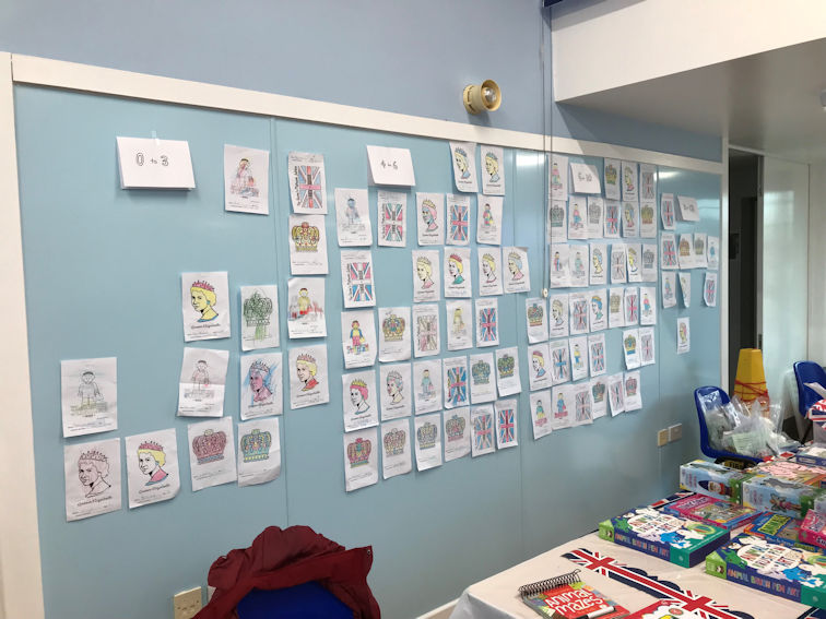 Colouring competition entries on display in the Pavilion, Trumpington Jubilee picnic. Photo: Amanda Nilsson, 5 June 2022.