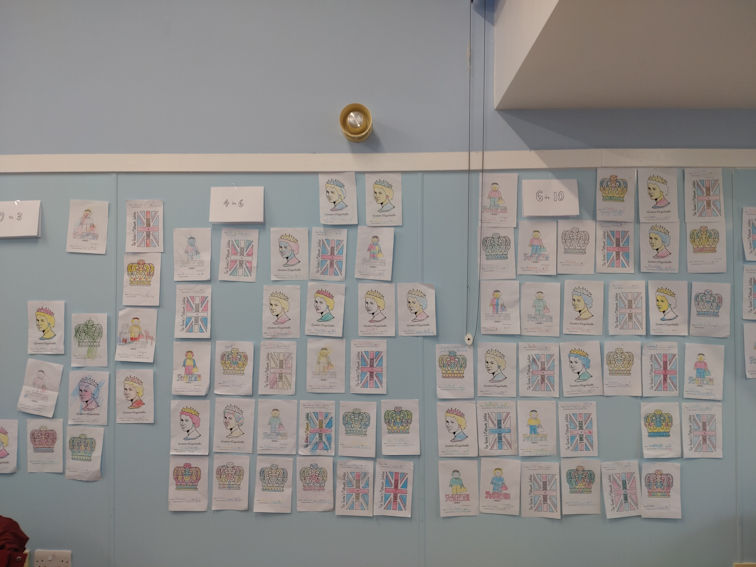Colouring competition entries on display in the Pavilion, Trumpington Jubilee picnic. Photo: Jenny Blackhurst, 5 June 2022.