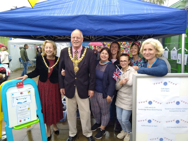 The Mayor and Mayoress, Councillor Mark Ashton and Barbara Ashton, with Trumpington Kids Clothes Hub. Photo: Joanne Webster, 5 June 2022.