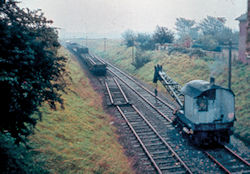 The removal of the railway track from the cutting to the east of Shelford Road bridge, 1969. Photo: Margaret Marrs, reproduced in Trumpington Past & Present, p. 22.