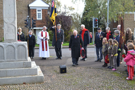John Travis laying a wreath on behalf of the Trumpington Royal British Legion at the War Memorial, Remembrance Sunday, 9 November 2014.