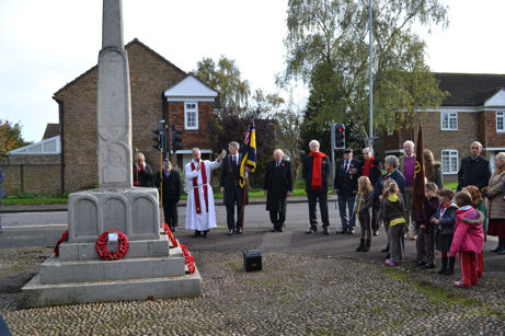 Rev. Andy Chrich at other participants at Trumpington War Memorial, Remembrance Sunday, 9 November 2014.