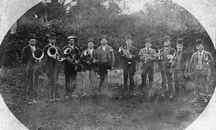 Trumpington Brass Band, dated between the 1860s and the early 1880s. From a photograph used by Percy Robinson during lectures in the 1920s-1940s.