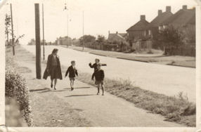 Children running along Shelford Road, on their way to the Church School, Trumpington, c. 1947. With Nancy Clarke and Barry Clarke, John Aves and another boy. Photo: Reg Clarke.