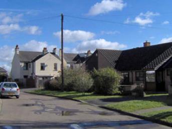 The left hand side of Exeter Close, Trumpington, looking towards Shelford Road. Photo: Hiltrud Hall, March 2008.