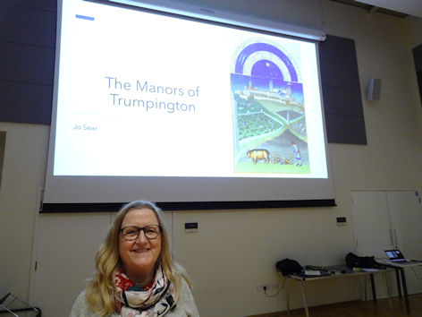 Dr Jo Sear preparing to speak at the Local History Group meeting about Trumpington’s manors. Photo: Andrew Roberts, 20 February 2025.