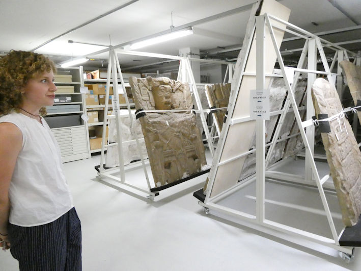 Plaster casts of Mayan stelae in the Centre for Material Culture, with Rosie Croysdale. Photo: Andrew Roberts, 4 August 2026.