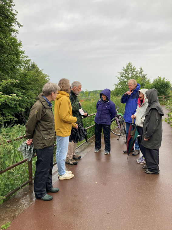 Participants with Howard Slatter at the footbridge over Hobson’s Brook during the walk on 13 June 2004. Photo: Annie Carr.