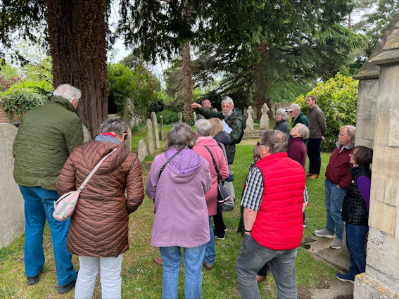 Howard Slatter talking in the churchyard, Local History Group walk, 1 June 2023. Photo: Janelle Robbins.